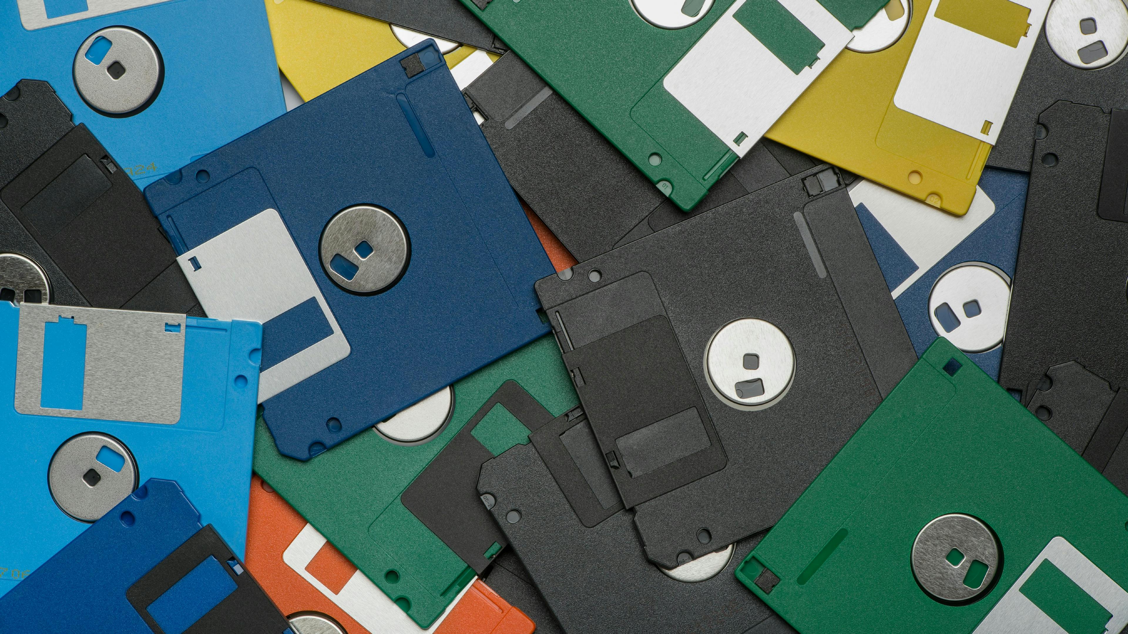 Colorful floppy discs in a pile